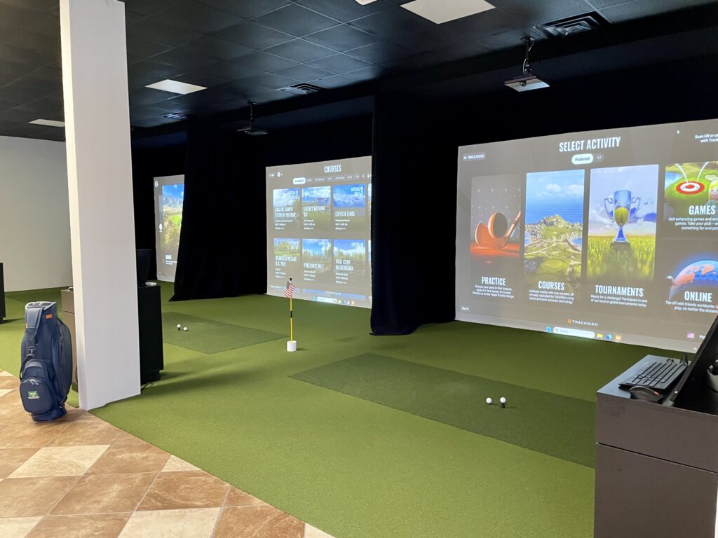 Trackman hitting bays and putting turf at Performance Indoor Golf in Pawleys Island